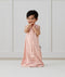 Toddler wearing ergoPouch Sleep Suit Bag 0.2 TOG Daisies