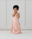 Toddler wearing ergoPouch Sleep Suit Bag 0.2 TOG Daisies