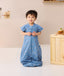 Toddler wearing ergoPouch Sleep Suit bag 1.0 TOG Petit Pretzel