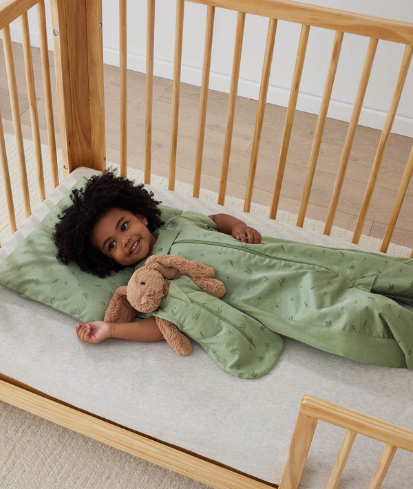 ergoPouch Organic Toddler Pillow And Case Willow with toddler in matching sleepwear