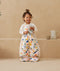 Toddler wearing a warm, ergoPouch Sleep Suit Bag 3.5 TOG Fruit Salad