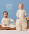 Baby sitting and toddler standing in cream convertible Sleep Suit Bag, demonstrating pouch mode and leg mode next to text reading 