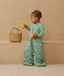 Toddler wearing an ergoPouch Sleep Suit Bag 2.5 TOG Sweet Orchard