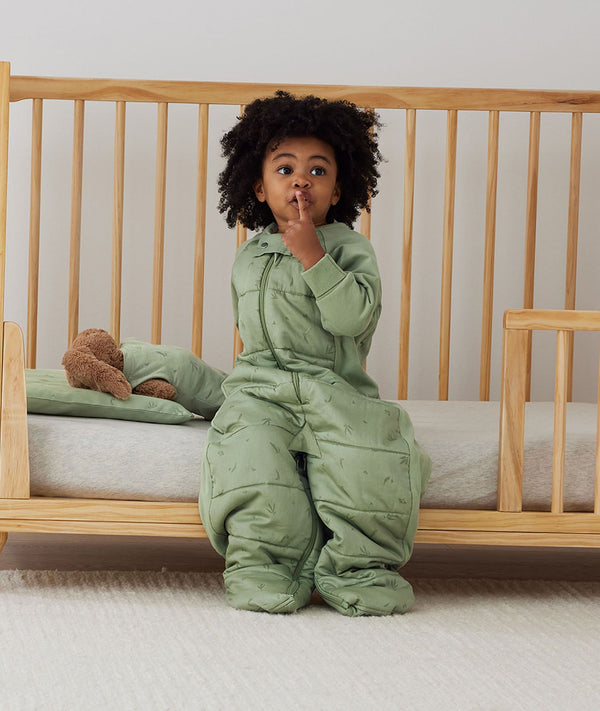 Toddler wearing an ergoPouch Sleep Suit Bag 2.5 TOG Willow