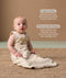 Baby wearing a sleeveless, patterned sleeping  bag sits on a woven rug, accompanied by product feature callouts for 