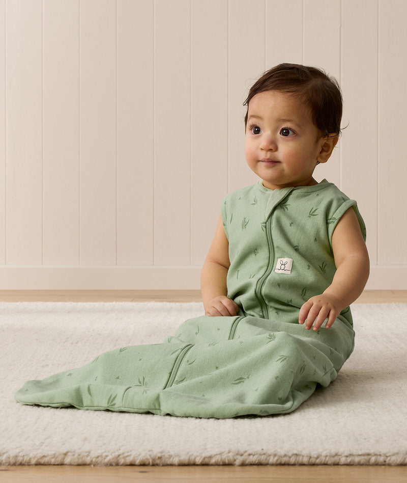 Infant wearing an ergoPouch Sleeping Bag 1.0 TOG Willow