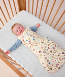 ergoPouch baby sleeping bag, featuring cute prints, made from organic, breathable materials.