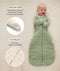 Baby lying down in a sage green Sleeping Bag 3.5 TOG, with inset images and text highlighting fold-over cuffs and a two-way zipper.