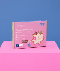 Packaging of the ergoPouch Cocoon Swaddle Bag 1.0 TOG Birthday Blobs