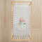Baby lying in cot under ergoPouch HugMe Blanket 0.2 & 1.0 TOG in Grey Marle 