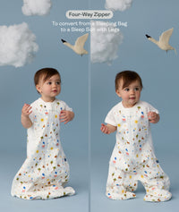 Two children wearing an ergoPouch Sleep Suit Bag 1.0 TOG Daydream, a sleeping bag that converts to a sleep suit with legs by a four-way zipper feature. 