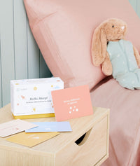 ergoPouch Hello, Sleep! Bedtime Affirmations for Kids on bedside table