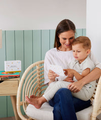 Toddler and mum reading ergoPouch Hello, Sleep! Bedtime Affirmations for Kids