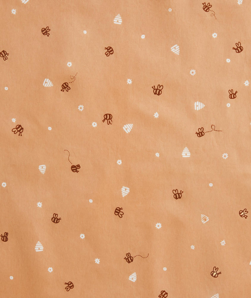 Close up of ergoPouch Honey Bees fabric print