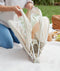 Folding the ergoPouch Easy Sleep Portable Crib Ecru