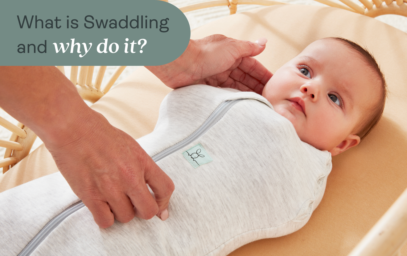 Parent reaching into crib to pick up a newborn baby who is swaddled, with text that reads What is Swaddling and why do it?