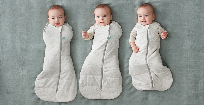 Three stages of baby learning to transition from swaddle to arms-out sleeping