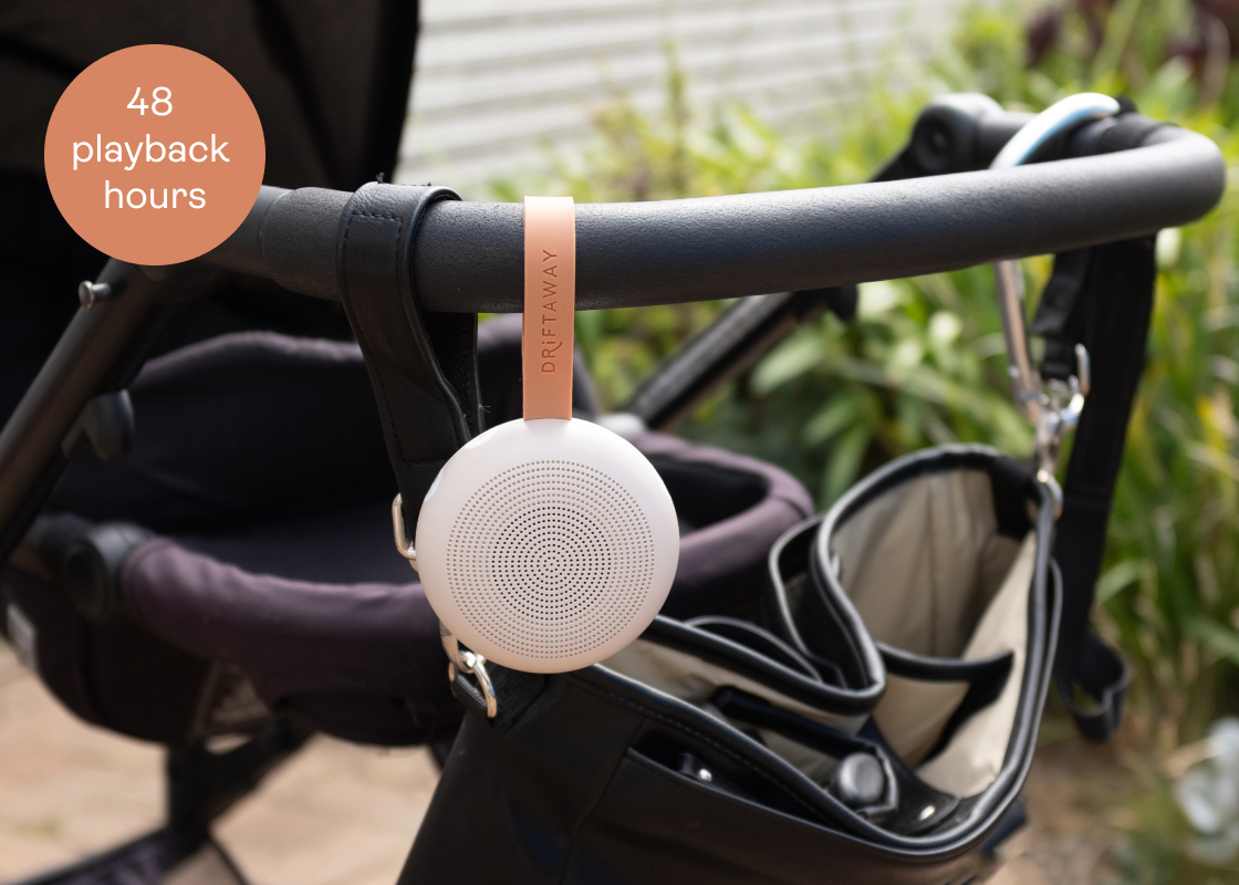 Portable white noise machine for baby attached to pram